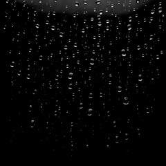 Obraz premium Black and white photo of raindrops on a window. Concept of calmness and tranquility