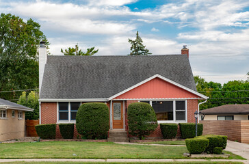 Private family home architecture. House exterior. Private house in suburban area. Suburban house architecture. Suburb exterior with private housing. Suburban neighborhood. Quiet neighborhood