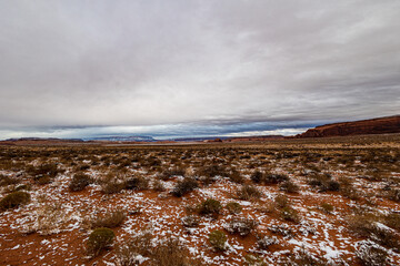Light snow in the early morning at Monument Valley.
