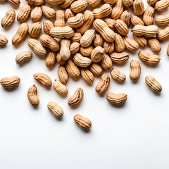 Obraz premium Scattered Peanuts on White Background
