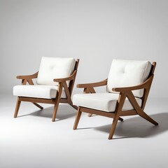 Fototapeta premium Pair of Modern Mid-Century Teak Armchairs with White Cushions