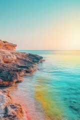 Serene coastal sunrise, rocky shore, calm turquoise water, soft light.