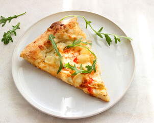 Pizza with cheese, tomatoes, pineapple and sauce