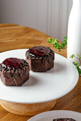 brownies with chocolate syrup on a plate