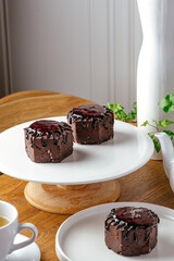 brownies with chocolate syrup on a plate