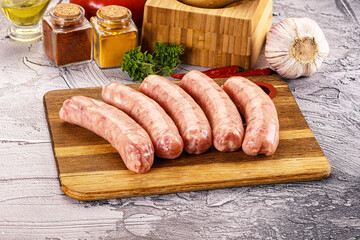Raw meat sausages for grill