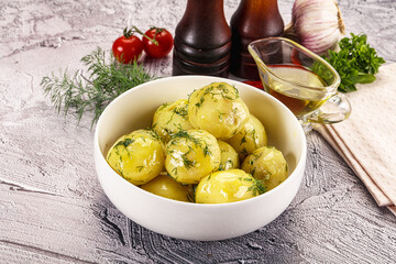 Young boiled potato with dill