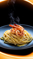 Rich fettuccine pasta topped with juicy prawns or shrimp served hot from the kitchen on a plate food photography wallpaper stock photo for menu