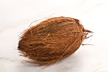 Natural exotic brown hairy coconut