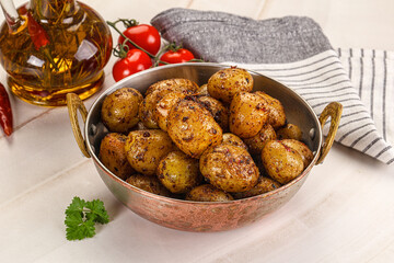 Baked mini potato with herbs