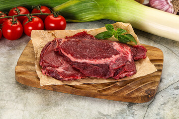 Raw beef cheeks cut for cooking