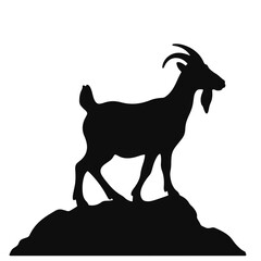 Silhouette of a goat standing on a hill, nature symbolism
