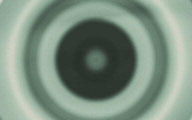 Abstract color gradient background, film grain texture, blurred orange gray white free forms on black background