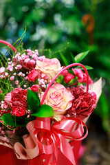 Fototapeta premium Romantic floral background with rose, carnation and gypsophila paniculata flowers.