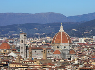 view of florence duomo in central italy with famous giotto bell tower and brunelleschi designed dome and apennine hills in background