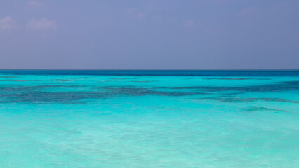 Vibrant turquoise sea in the tropical Maldives