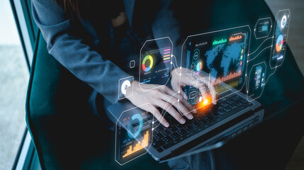 A professional using a laptop, surrounded by digital data displays, highlighting technology and data analysis in a modern workspace.