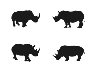Black rhino silhouette. Hand drawn Sahara animal. Rhino Animal Silhouette. Dangerous rhinoceros standing in different positions. Vector illustration isolated on a white background.