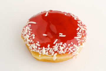 Strawberry Jam Donut with grated cheese on a white background

