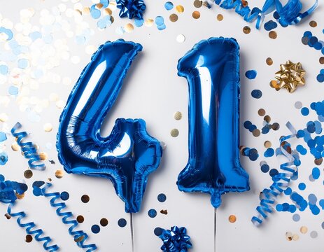 Blue balloon number 41 for forty-first birthday or anniversary party. White background with confetti