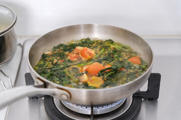 Ca Kangkung Belacan or Stir fried water spinach, Indonesian food
