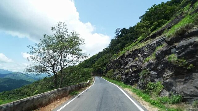A video of driving on a winding mountain road with dangerous curves and sharp, edgy turns