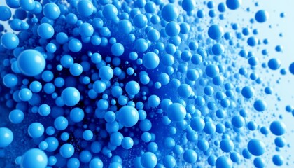 A mass of blue spheres of varying sizes fills the frame, creating a bubbly, abstract texture. Ideal for science, technology, or abstract themes.