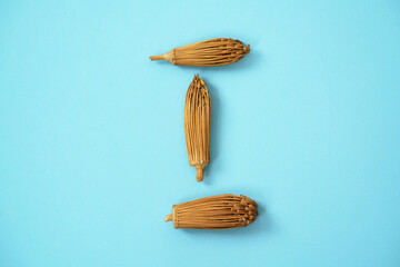 chinese tea set on a flat cyan background