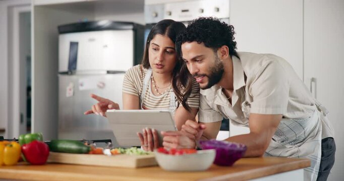 Cooking, tablet and couple for online recipe for dinner, lunch and meal prep ideas in kitchen. Home, food and man with woman on digital tech for healthy eating, nutrition and wellness with vegetables
