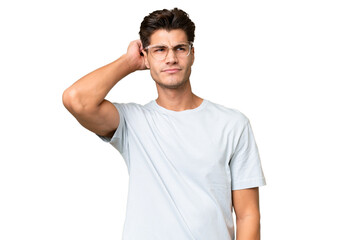 Obraz premium Young caucasian handsome man over isolated background having doubts