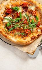 Italian Pizza with fresh mozzarella and basil leaves. Italian Traditional Pizza Margherita..