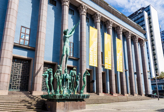 Stockholm, Sweden - Aug. 6, 2024: The Orpheus Well fountain by Carl Milles in front of the Stockholm Concert Hall by Ivar Tengbom, built in 1926 and home to the Royal Stockholm Philharmonic Orchestra.