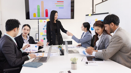 Group of business people working together with dashboard analysis and data management a meeting table in office.