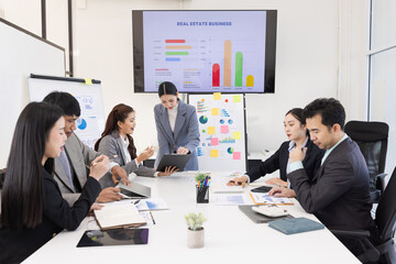 Group of business people working together with dashboard analysis and data management a meeting table in office.