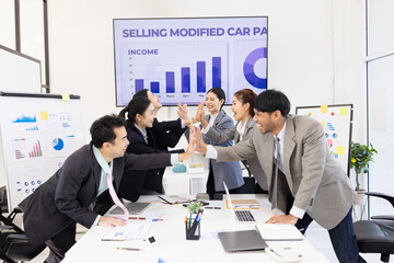Group of business people working together with dashboard analysis and data management a meeting table in an office.