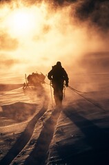 Endurance in the Elements: A lone adventurer braves the unforgiving wilderness, silhouetted against a dramatic, sun-drenched sky, pulling a sled through a snow-covered expanse.