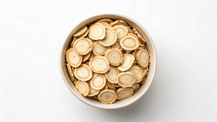 Circular golden snacks in bowl on white surface, overhead view, geometric pattern, texture