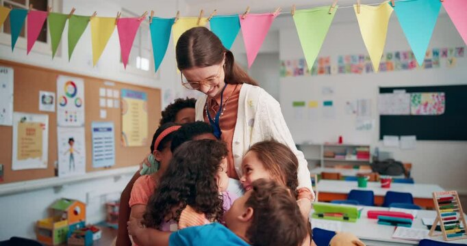 Teacher, happy and hug children in classroom, school and support with growth development at academy. Education, thank you and embrace with kids, students gratitude and love for learning knowledge