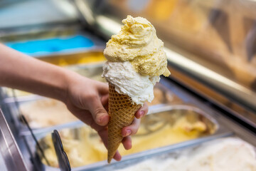 Tasty Ice Cream Cone in Hand