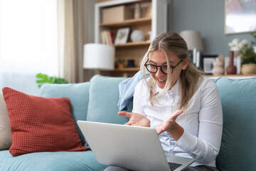 Young cozy relaxed self loved business woman talking online with psychotherapist on video call, say...