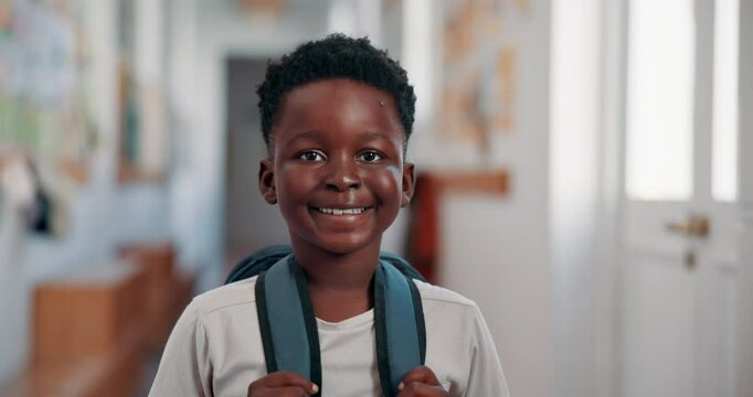 Education, future and face of black boy at school for learning, knowledge and smile. Child development program, study and growth with kid in hallway of Stem academy for student, classroom and youth