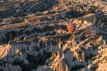 Nevsehir, Turkey. Colorful hot air balloon flying over Cappadocia, Turkey. Hot air balloons flying in sunrise sky.