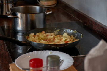 Close-up of fresh vegetables sautéing in a pan for a delicious homemade dish