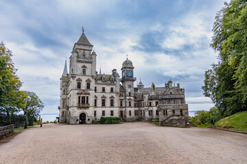 Dunrobin Castle, fairy-tale gem overlooking North Sea, offers breathtaking gardens, exquisite...