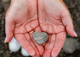 rocky heart in hands