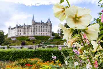 Dunrobin Castle, fairy-tale gem overlooking North Sea, offers breathtaking gardens, exquisite...