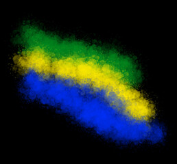 Colorful powder explosion creating the colors of the brazilian flag on black background