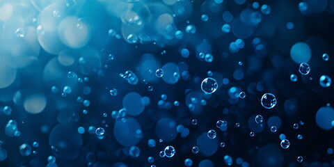 Deep blue abstract background. Flying soap bubbles with bokeh effect