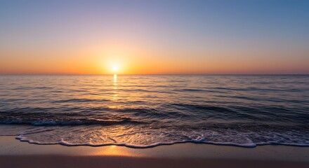 Obraz premium Serene Beach Sunrise with Crystal Clear Water