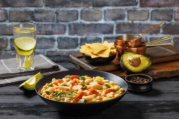 white bean chickpea chili with sausages, zucchini